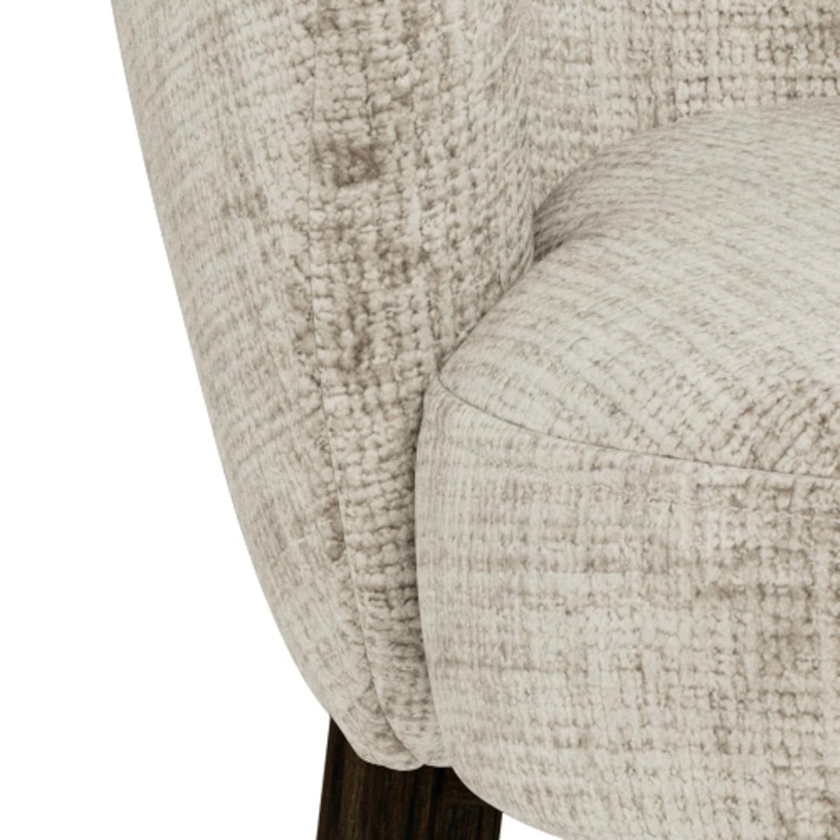 Cremefarbener Sessel mit strukturiertem Webstoff und dunklen Holzbeinen in moderner Schweizer Designqualität