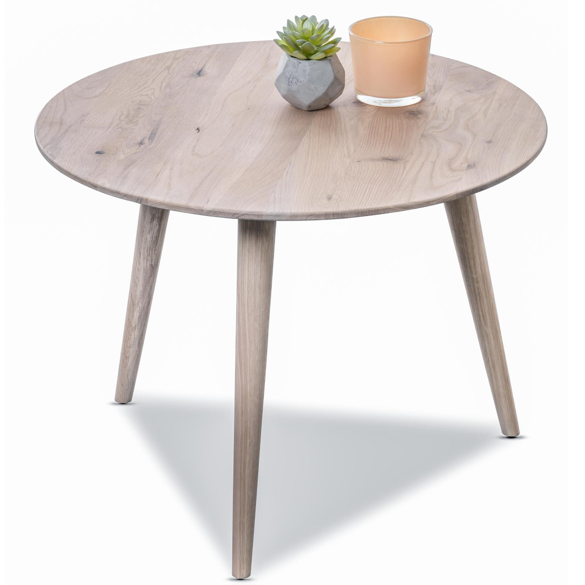 Runder Couchtisch Oslo aus Eiche Bianco mit drei Beinen, Dekoration mit Pflanze und Kerze