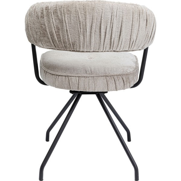 Fauteuil pivotant en tissu argenté de la marque Kare