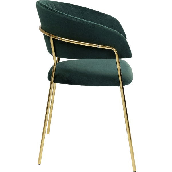 Fauteuil en velours vert de Kare