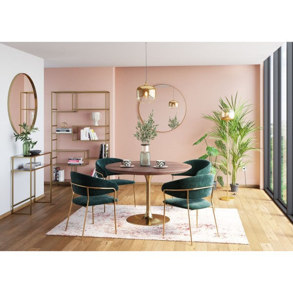 Fauteuil en velours vert de Kare