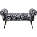 Elegante Sitzbank „Wing Zebra" mit schwarz-weißem Zebramuster und geschwungenen Armlehnen auf schwarzen Beinen
