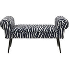 Elegante Sitzbank „Wing Zebra" mit schwarz-weißem Zebramuster und geschwungenen Armlehnen auf schwarzen Beinen