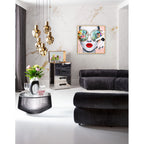 Modernes Wohnzimmer mit schwarzem Sofa, goldenem Hängeleuchter und KARE Times Square View Bild 80x80