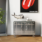 KARE Buster Kommode in Silber auf Rollen mit Fisch-Skulptur und Rolling Stones Poster im Hintergrund