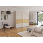 Rauch Malva Schwebetürenschrank 226cm in Champagner/Eiche im modernen Schlafzimmer