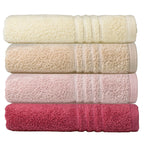 4 gestapelte Frottee-Handtücher in Cremeweiß, Beige, Altrosa und Pink von Kela Serie Leonora
