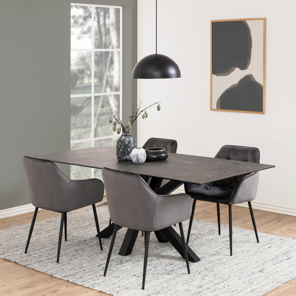 Table de salle à manger en céramique noire avec piètement en croix, style industriel