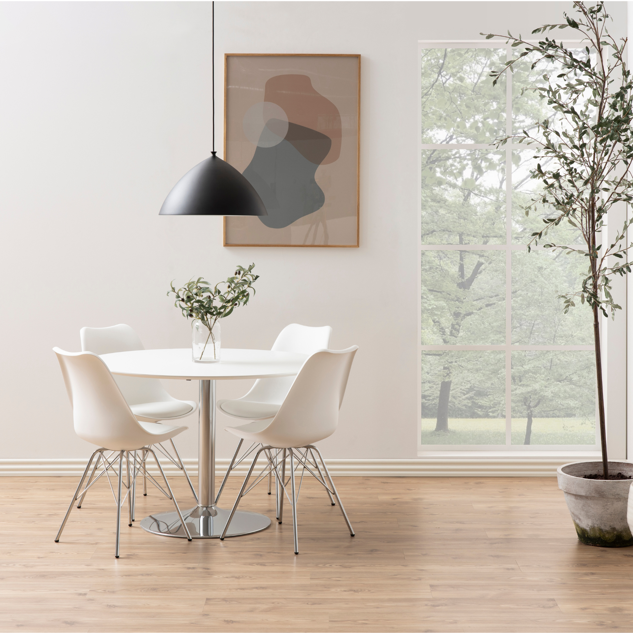 Chaise blanche à pieds en acier