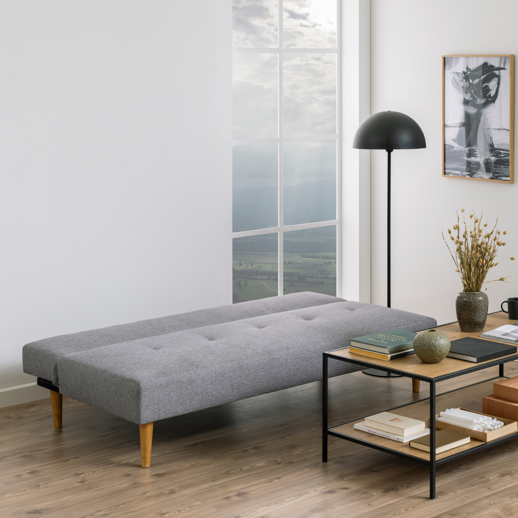 Canapé-lit gris clair avec dossier réglable