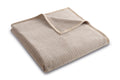 Biederlack Kuscheldecke Feel in Taupe, weiche gefaltete Wohndecke mit Rippenstruktur und satiniertem Rand