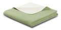 Biederlack Kuscheldecke Doubleface in Mint-Grün und Creme, gefaltet mit Ziernaht-Detail
