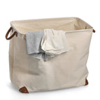 Zeller Wäschesammler Canvas beige mit Lederdetails und Ringgriffe, gefüllt mit Wäsche