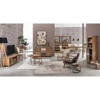 Wohnzimmer mit Holzmöbeln: Sessel Mathilde, TV-Möbel, Sideboard, Couchtische und Weinregal im Landhausstil