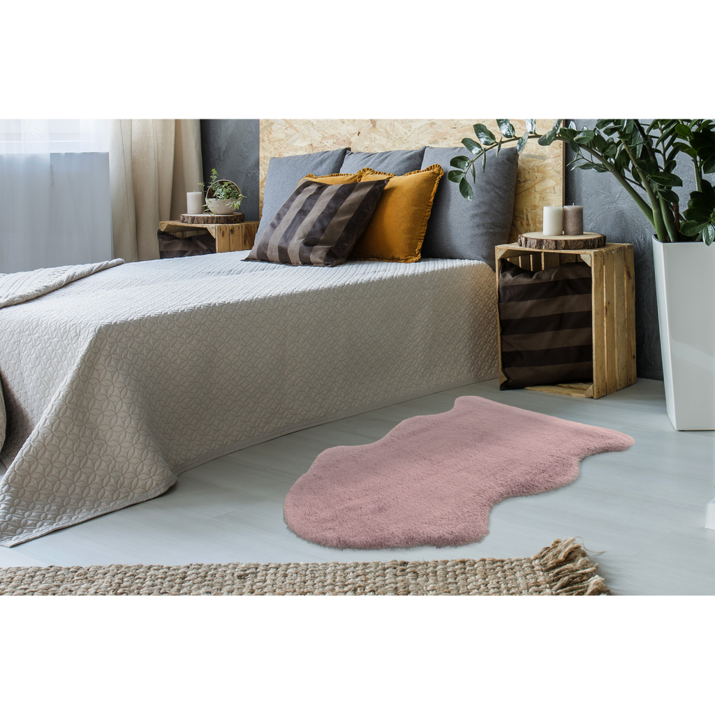 Fourrure synthétique rose poudré douillette