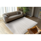 Lalee Comfort Teppich in Creme/Weiss mit geschwungenen Linien in modernem Wohnzimmer mit Sofa