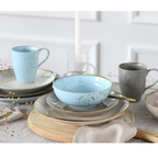 Creatable Kombiservice Nature Scandinavia 16-tlg. in Hellblau und Grau mit Goldrand auf gedecktem Tisch