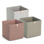 Aufbewahrungsboxen aus Stoff in Grau, Beige und Rosa mit Griffen für stilvolle Ordnung.