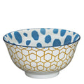 Kuchenprofi Cilio Bowl Amici mit Wabenmuster aussen in Gold und blauen Punkten innen, weisse Keramikschale