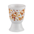 Kuchenprofi Cilio Eierbecher Amici aus weißem Porzellan mit buntem Blumenmuster in Orange und Braun