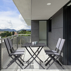 Bizzotto Klapptisch Elin 110x70cm auf moderner Balkonterrasse mit Bergblick und Designerstühlen