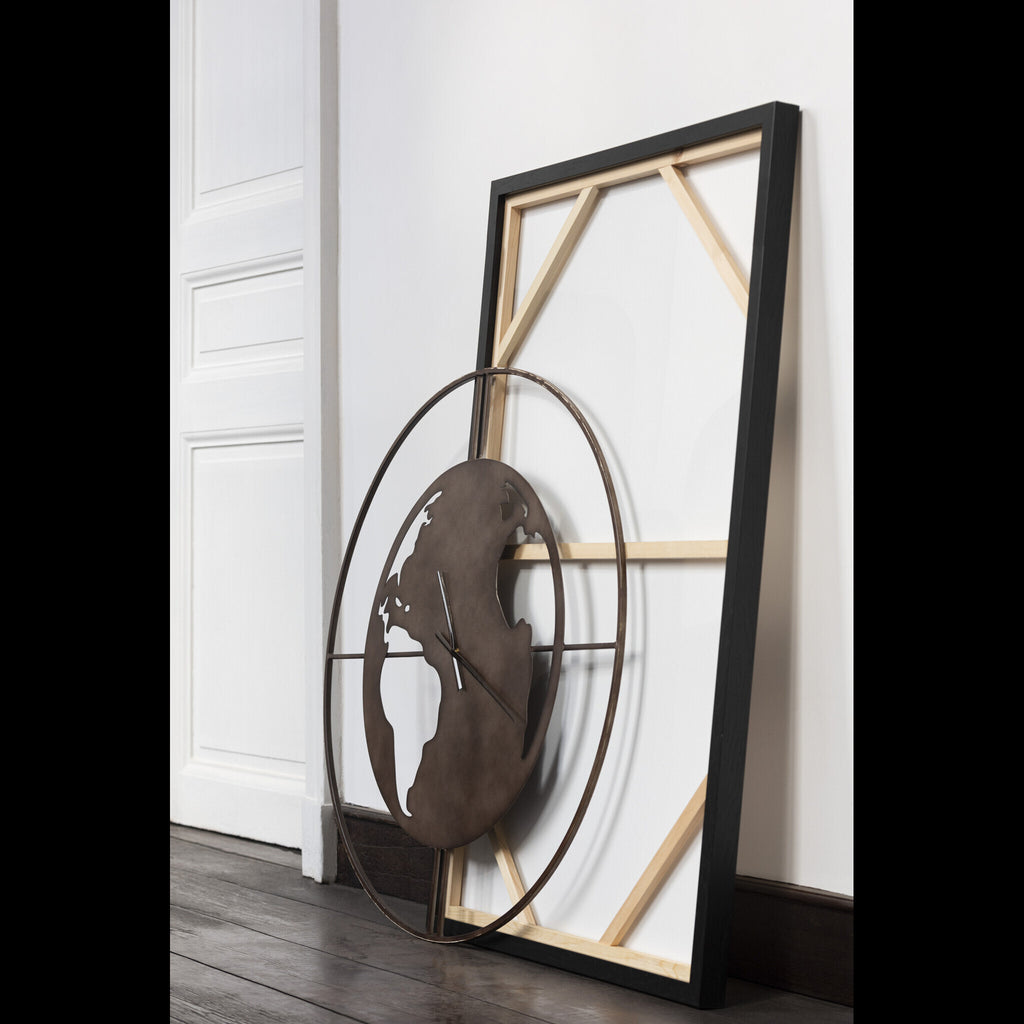 Horloge carte du monde en métal perforé L 90cm