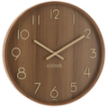 Runde Wanduhr aus dunklem MDF-Holz mit goldenen Ziffern und Zeigern, Aufschrift „o'clock", J-Line Design