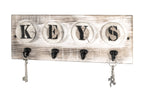 HAKU Möbel Schlüsselboard aus Massivholz Motiv Baumscheibe und Schriftzug in Grau