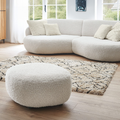 Runder Boucle-Hocker Weiss von Gutmann New Spirit im modernen Wohnzimmer mit passendem Sofa