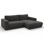 Graues Ecksofa mit Longchair, modernes Design, Feincord-Polsterung, Anthrazit-Farbe, hochwertige Schweizer Möbel.