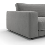 Graues Sofa Armlehndetail mit Feincord-Stoff, modernes Design für elegante Wohnzimmer.