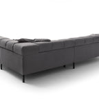 Modulares Ecksofa Wilson in dunkelgrauem Cord mit hohen Rückenlehnen und Metallfüßen.