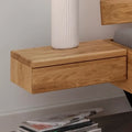 Hängenachtkonsole Faaborg aus Eichenholz mit Stauraum und modernem Design für das Schlafzimmer.